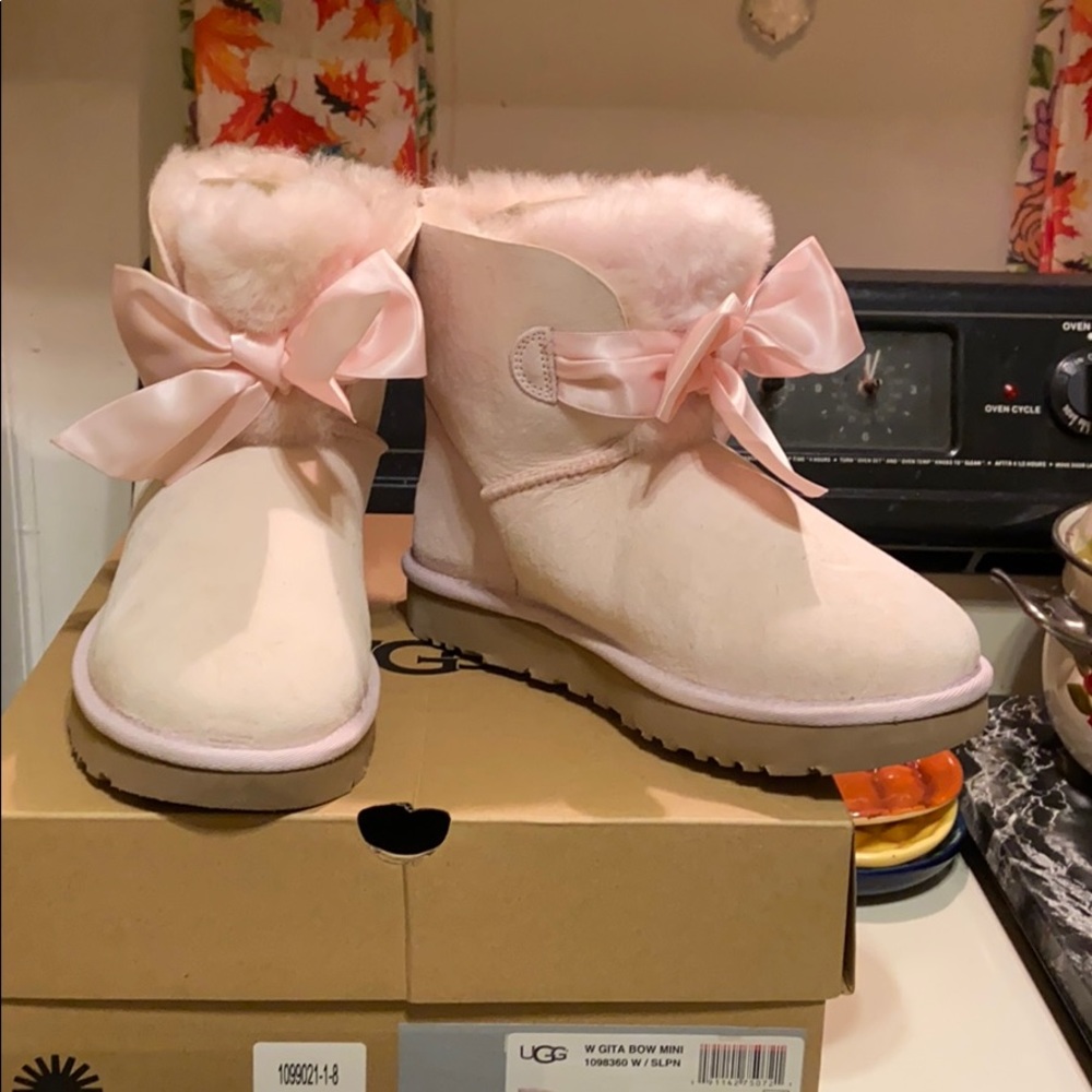 Ugg w Gita bootie with bow. Worn once
